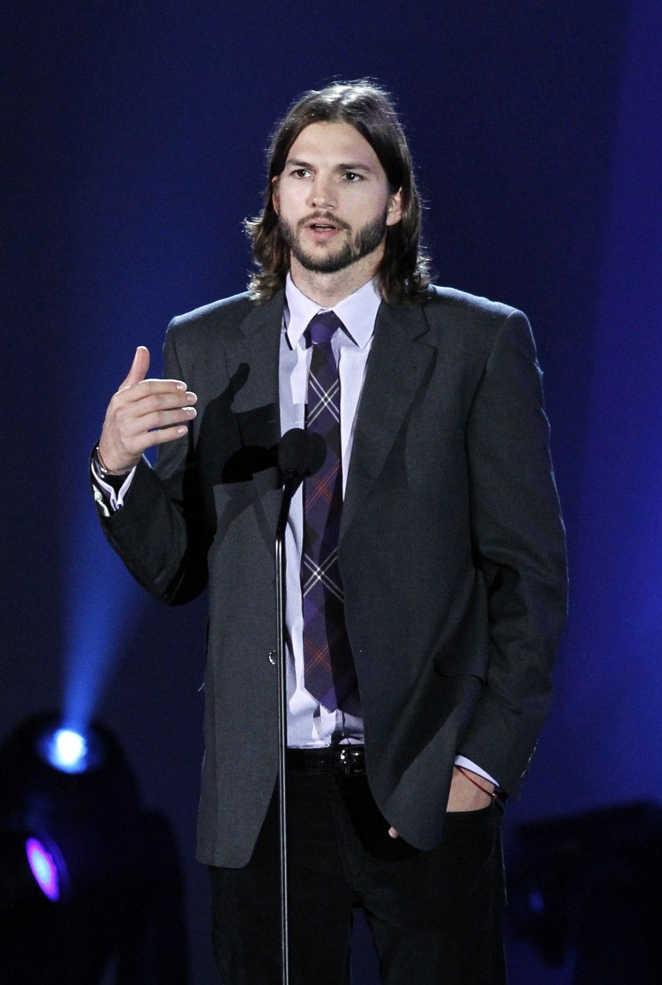 Actor Ashton Kutcher speaks during quotA Decade of Difference A Concert Celebrating 10 Years of the William J. Clinton Foundationquot at the Hollywood Bowl in Hollywood, California 