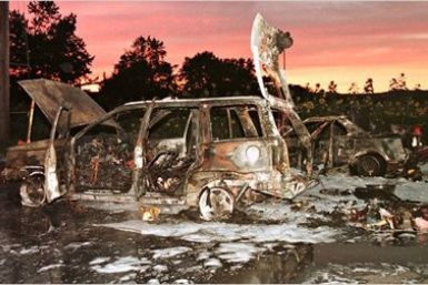 A 1993 to 2004  model year Jeep after a car fire