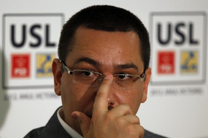 Romania&#039;s Prime Minister and Social Liberal Union alliance leader Ponta gestures during a news conference in Bucharest