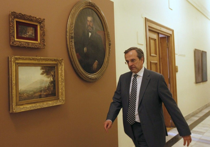 Conservative leader Samaras arrives at parliament for a meeting in Athens