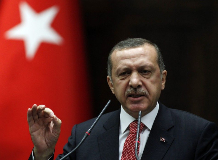 Turkey&#039;s PM Erdogan addresses members of parliament from his ruling AK Party during a meeting at the Turkish parliament in Ankara