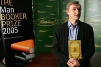The Man Booker Prize nominated British author Julian Barnes holds his book &#039;Arthur and George&#039; in London ahead of tonight&#039;s award ceremony, October 10, 2005. Barnes is favourite to win the annual literary prize of £50,000 ($88,000).