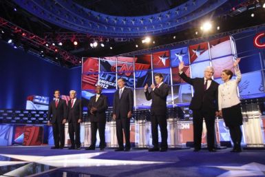 GOP presidential candidates (L-R) Rick Santorum, Ron Paul, Herman Cain, Mitt Romney, Rick Perry, Newt Gingrich and Michele Bachmann during the CNN Debate, moderated by Anderson Cooper.