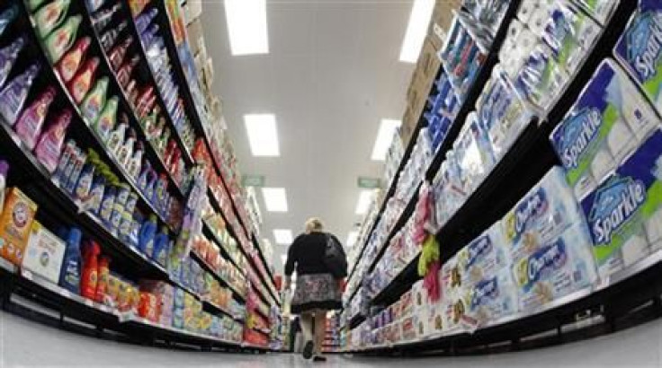 A shopper walks down an aisle in a newly opened Walmart Neighborhood Market in Chicago