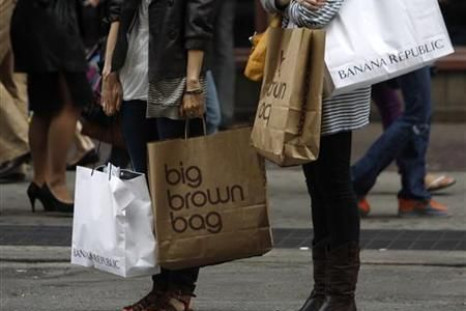 Shoppers carry their purchases along Broadway in New York City