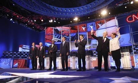 GOP presidential candidates (L-R) former Pennsylvania Senator Rick Santorum, Rep. Ron Paul (R-TX), businessman Herman Cain, former Massachusetts Governor Mitt Romney, Texas Governor Rick Perry, former House of Representatives Speaker Newt Gingrich and Rep
