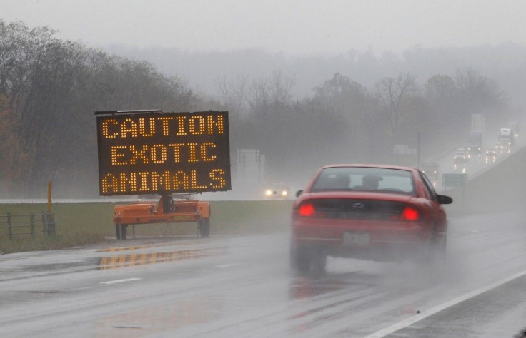 A sign posted on Interstate 70 warns drivers of animals loose in the area around Zanesville, Ohio October 19, 2011.