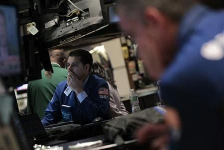 Traders work on the floor of the New York Stock Exchange