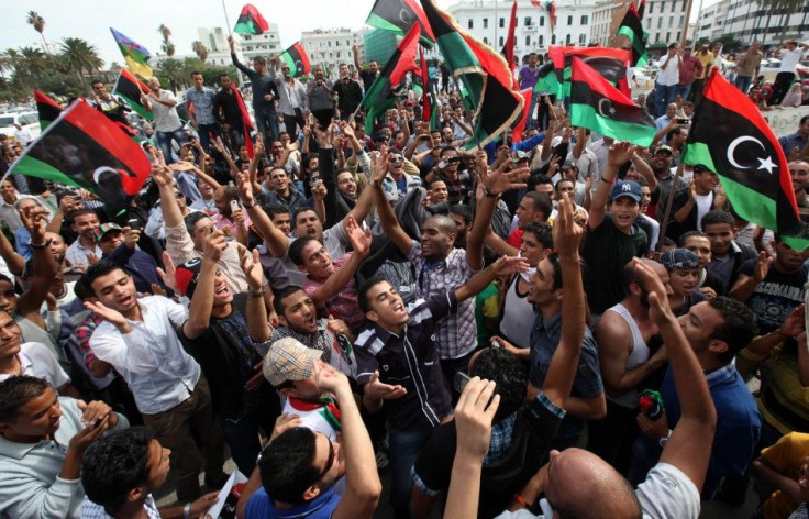 Libyans celebrate at Martyrs square in Tripoli