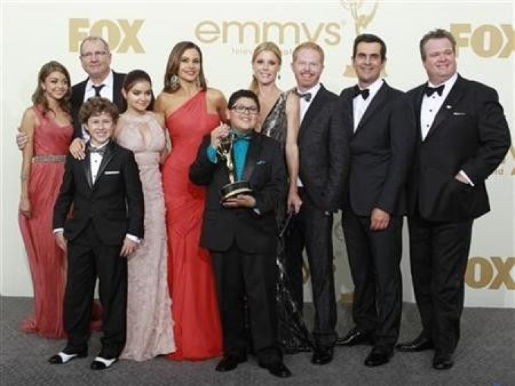 (L-R) The cast of &#039;&#039;Modern Family&#039;&#039; Sarah Hyland, Nolan Gould, Ed O&#039;Neill, Ariel Winter, Sofia Vergara, Rico Rodriguez, Julie Bowen, Jesse Tyler Ferguson, Ty Burrell and Eric Stonestreet pose backstage after the show won for best 