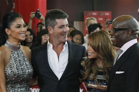 Nicole Scherzinger (L to R), Simon Cowell, Paula Abdul and Antonio Reid attend the world premiere of the television series ''The X Factor'' at the Arclight Cinerama Dome in Hollywood, California