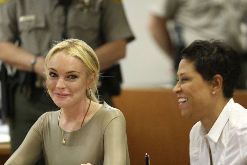 Lohan, with her attorney Shawn Chapman Holley, appears in Airport Courthouse in Los Angeles