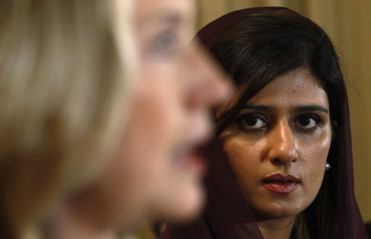 U.S. Secretary of State Hillary Clinton speaks as Pakistan&#039;s Foreign Minister Hina Rabbani Khar listens during a joint press availability in Islamabad