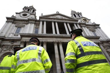 Police officers stand outside St Paul&#039;s Cathedral in central London