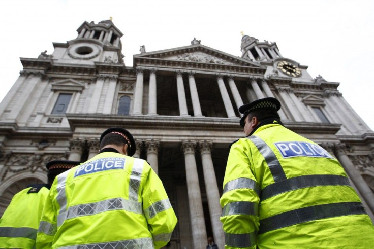 Police officers stand outside St Paul&#039;s Cathedral in central London