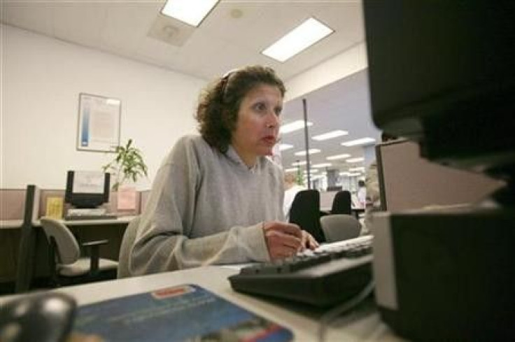 Unemployed clerical worker Mayre Milo searches for a job at the California Employment Development Department in San Francisco, California September 4, 2009. 