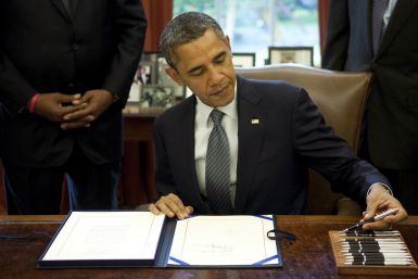 Barack Obama signing