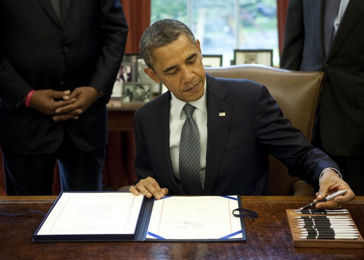 Barack Obama signing