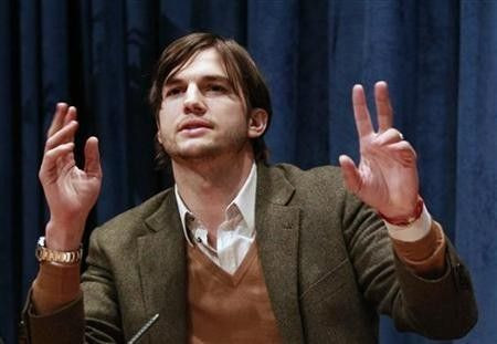 Actor Ashton Kutcher speaks during a news conference at the United Nations Headquarters in New York