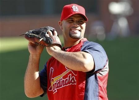 St. Louis Cardinals first baseman Albert Pujols takes part in practice a day prior to Game 3 of MLB's World Series baseball championship in Arlington, Texas