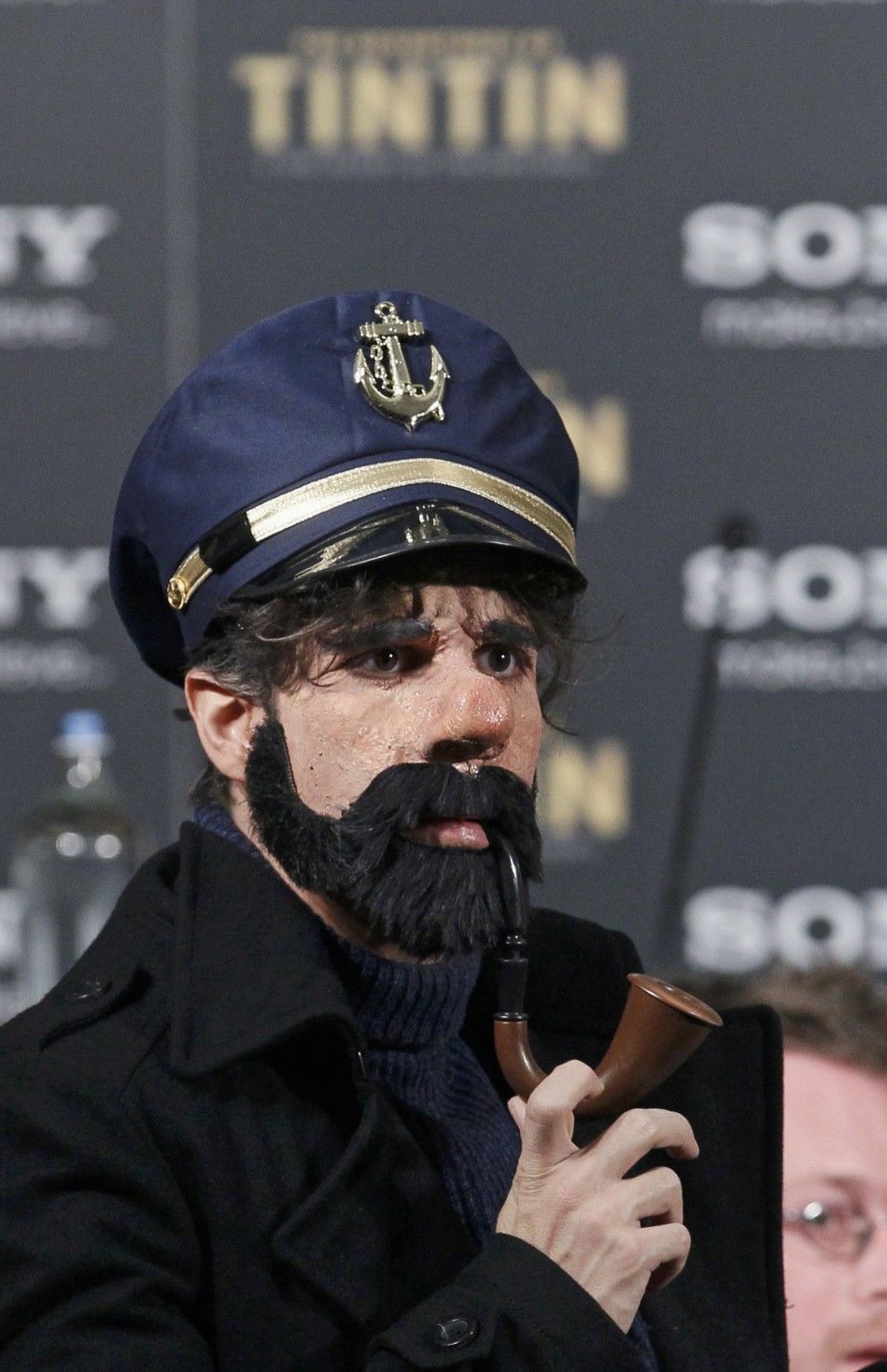 Cast member Daniele Rizzo is dressed as Captain Haddock, his role in the new Tintin movie, in Brussels