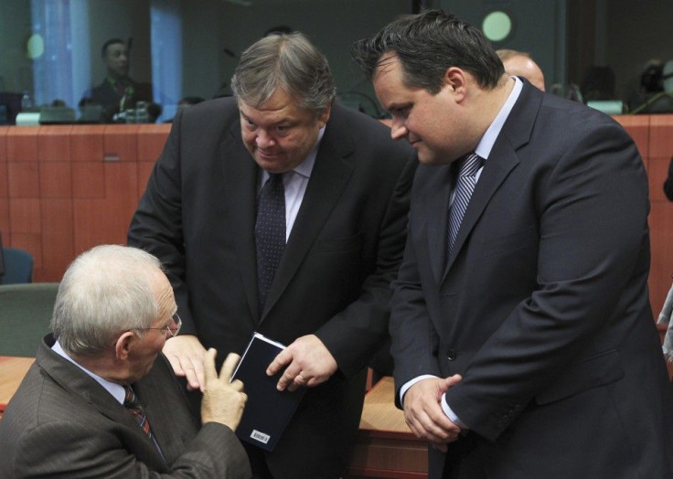 Finance ministers, Germany's Schaeuble, Greece's Venizelos and Dutch de Jager talk together during an eurozone finance ministers meeting in Brussels