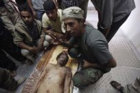 Moammar Gadhafi died from gunshot to the head