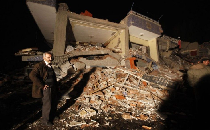 Turkey Survivors Stand in Rubble