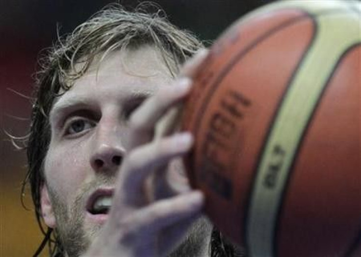 Dirk Nowitzki of Germany holds onto the ball during their FIBA EuroBasket 2011 Group E basketball game against Lithuania in Vilnius