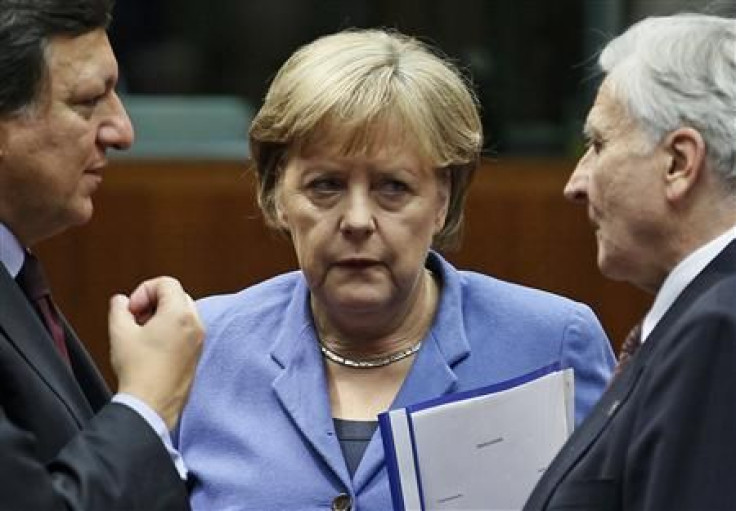 (L to R) European Commission President Jose Manuel Barroso (L), Germany's Chancellor Angela Merkel (C) and European Central Bank President Jean-Claude Trichet (R) 