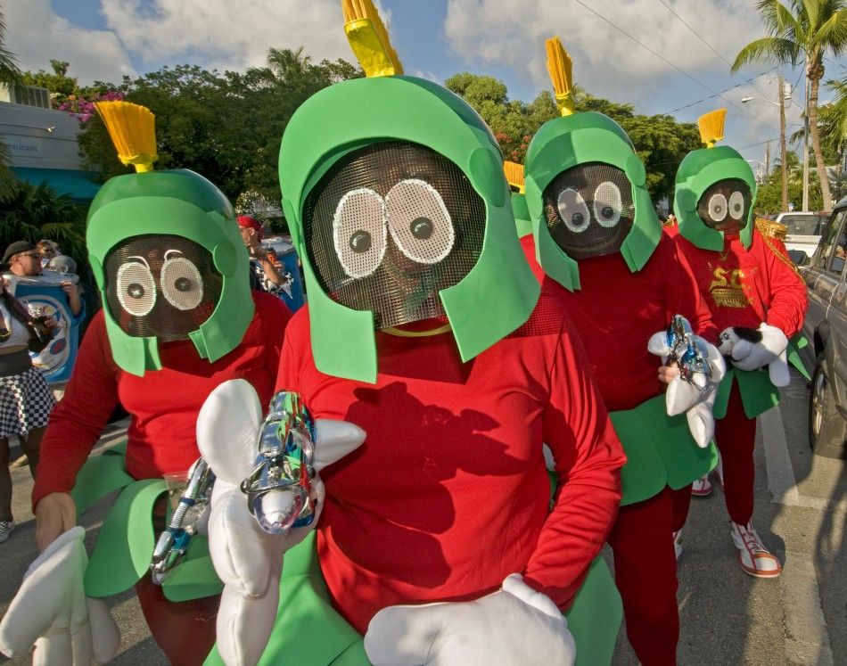 People dressed as Marvin the Martian stroll in the Fantasy Fest Masquerade March in Key West, Florida, October 29, 2010. 