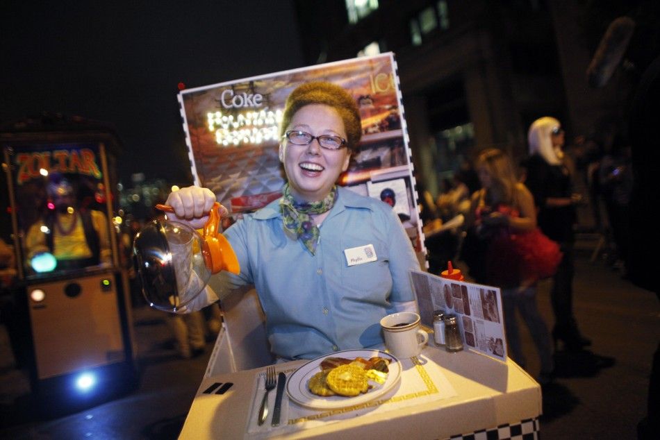 A woman wears a costume depicting a waitress serving breakfast and coffee at the annual Halloween parade in Greenwich Village in New York October 31, 2009.