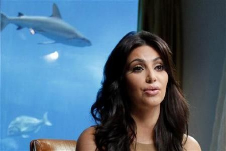 TV personality and actress Kim Kardashian speaks during an interview with Reuters in Dubai