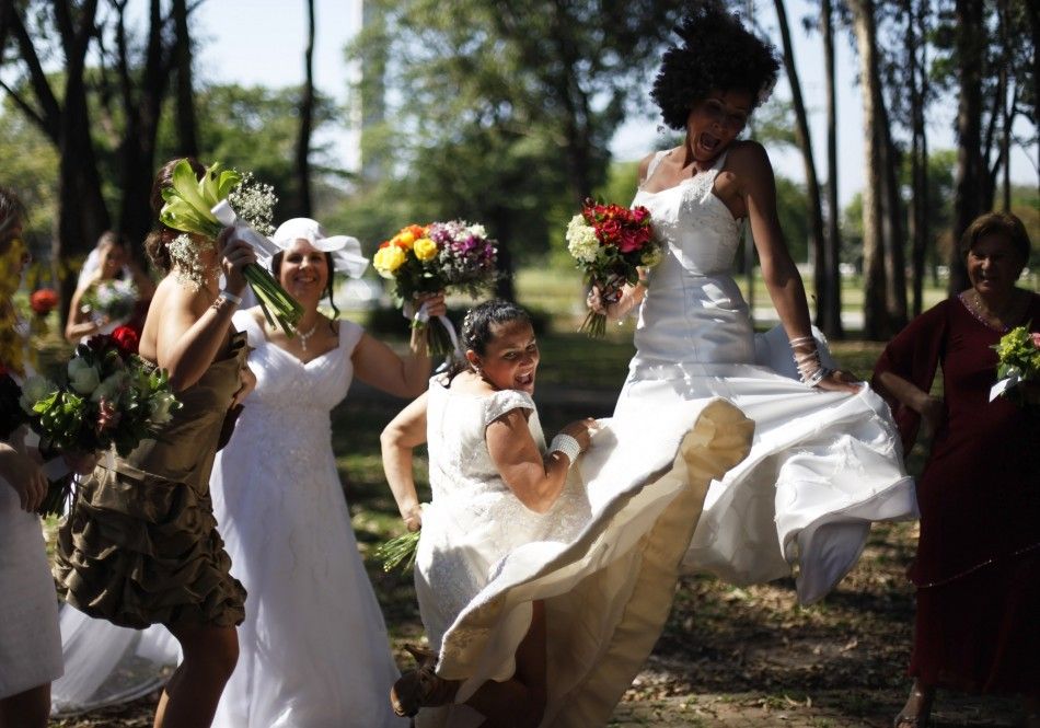 Women in wedding gowns jump during the quotParade of Bridesquot in Sao Paulo 