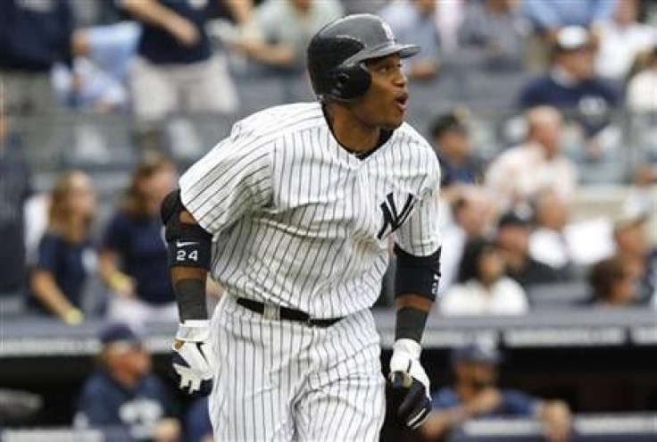 Yankees clinch playoff berth with comeback win