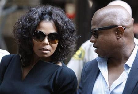Janet (L) and Randy Jackson, siblings of deceased pop star Michael Jackson, leave court after the opening day of Dr. Conrad Murray's trial in the death of pop star Michael Jackson in Los Angeles