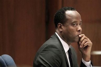 Dr. Conrad Murray sits in a courtroom during his involuntary manslaughter trial in Los Angeles