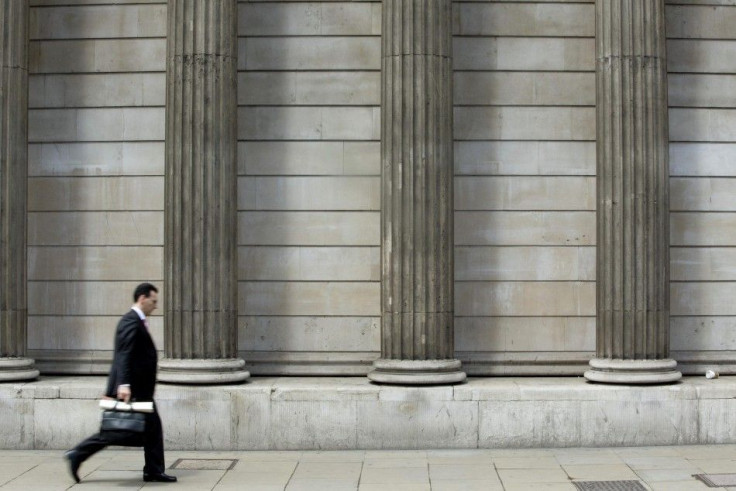 A man walks throught the Square Mile, the financial center of the city of London. Banking associations were &quot;shocked&quot; at the banking fraud.