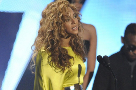 Beyonce Knowles accepts her award for best R&B artist at the 2012 BET Awards in Los Angeles