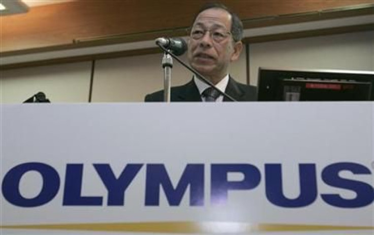 Olympus Corp President Kikukawa speaks during a news conference in Tokyo