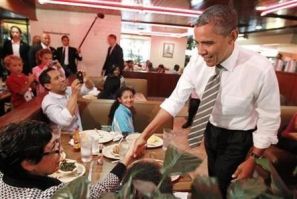 President Barack Obama greets diners at Roscoe&#039;s House of Chicken and Waffles in Los Angeles