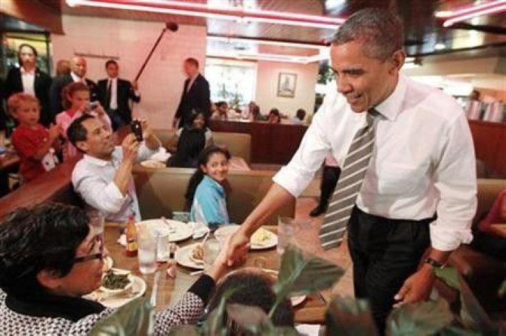 President Barack Obama greets diners at Roscoe&#039;s House of Chicken and Waffles in Los Angeles