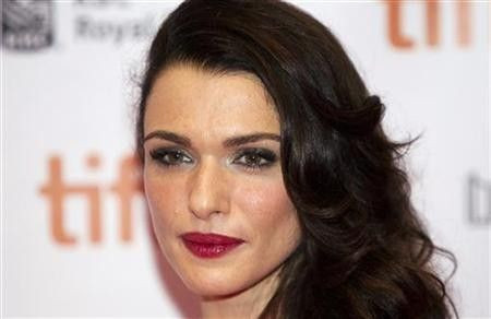 Cast member Rachel Weisz arrives on the red carpet for the film ''The Deep Blue Sea'' during the 36th Toronto International Film Festival (TIFF)