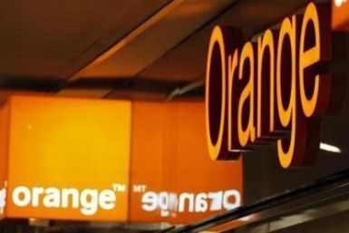 Logos of Orange are seen in front of an Orange France Telecom shop in Nice, southern France