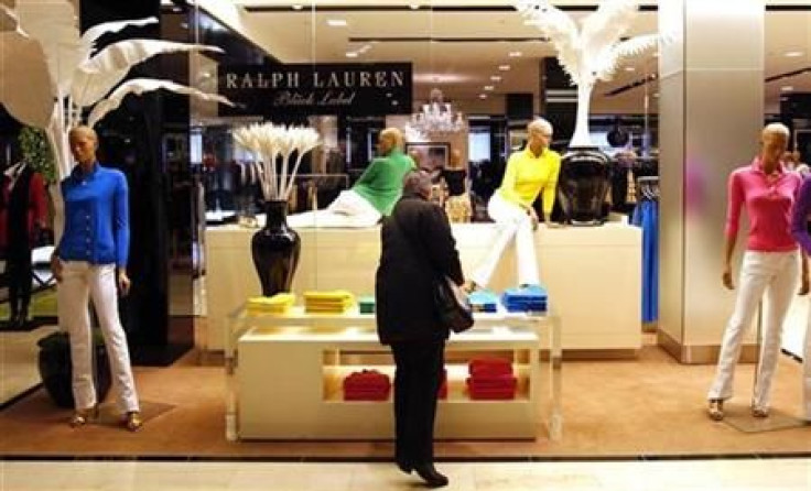 Shopper looks at goods by designer Ralph Lauren in Bloomingdales department store in New York as holiday shopping season begins