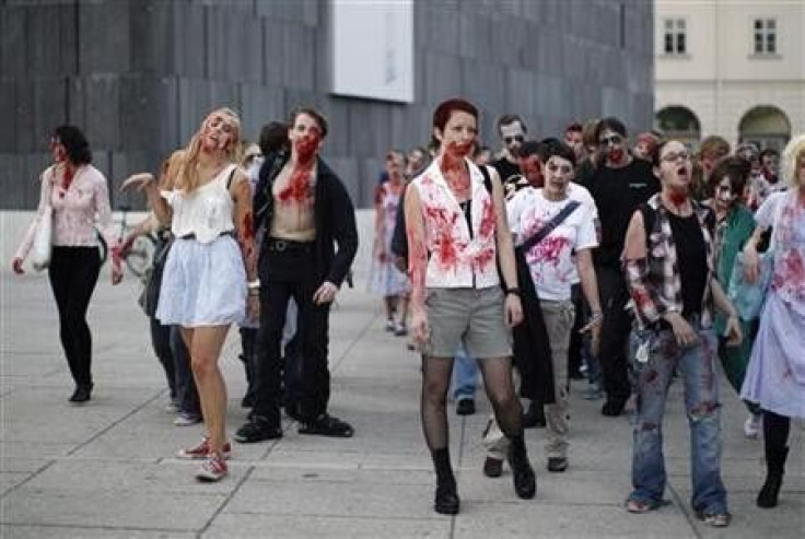 People dressed as zombies take part in a flashmob in Vienna