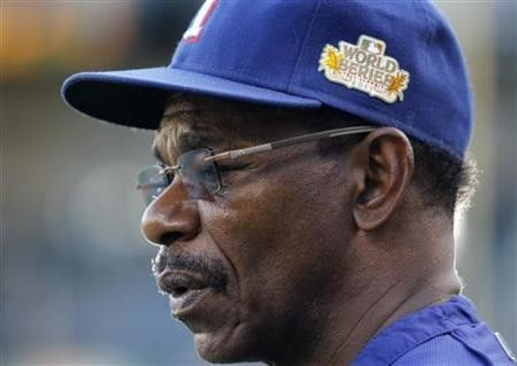 Texas Rangers manager Ron Washington watches batting practice a day prior to Game 3 of MLB&#039;s World Series baseball championship in Arlington, Texas