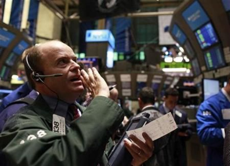 Traders work on the floor of the New York Stock Exchange