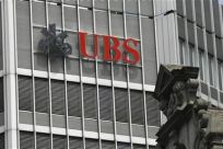The logo of Swiss bank UBS is seen on a building in Zurich