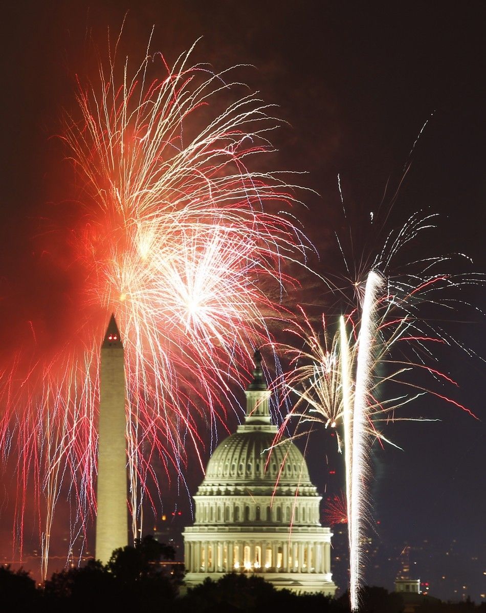 Fireworks over the U.S. Capitol and Washington Monument. 